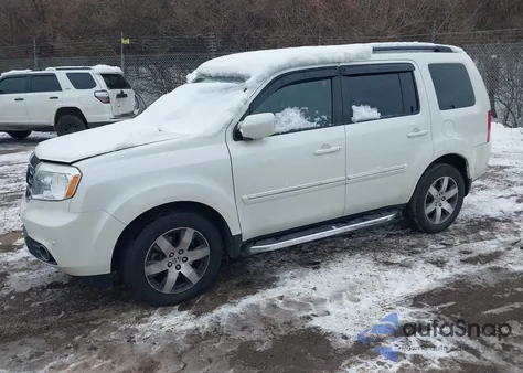 2014 Honda Pilot Touring z USA, uszkodzony, nr VIN 5FNYF4H95EB003173